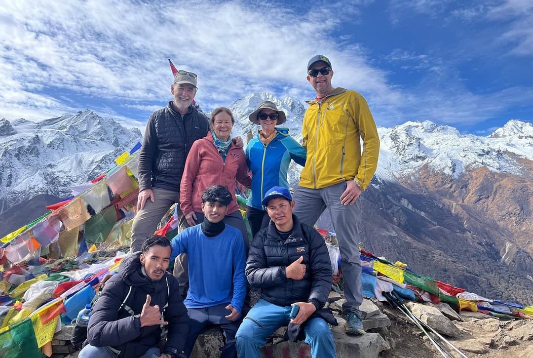 Trekkers At The Summit During Langtang Valley Trek