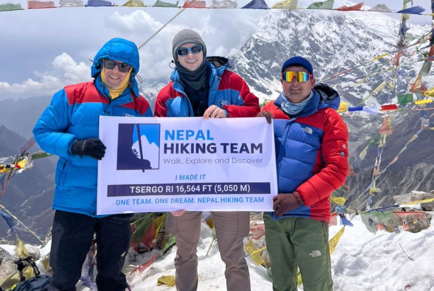Langtang Valley Trek trekkers with Nepal Hiking Team at Tsergo Ri summit 5050 meters with Himalayan mountain views