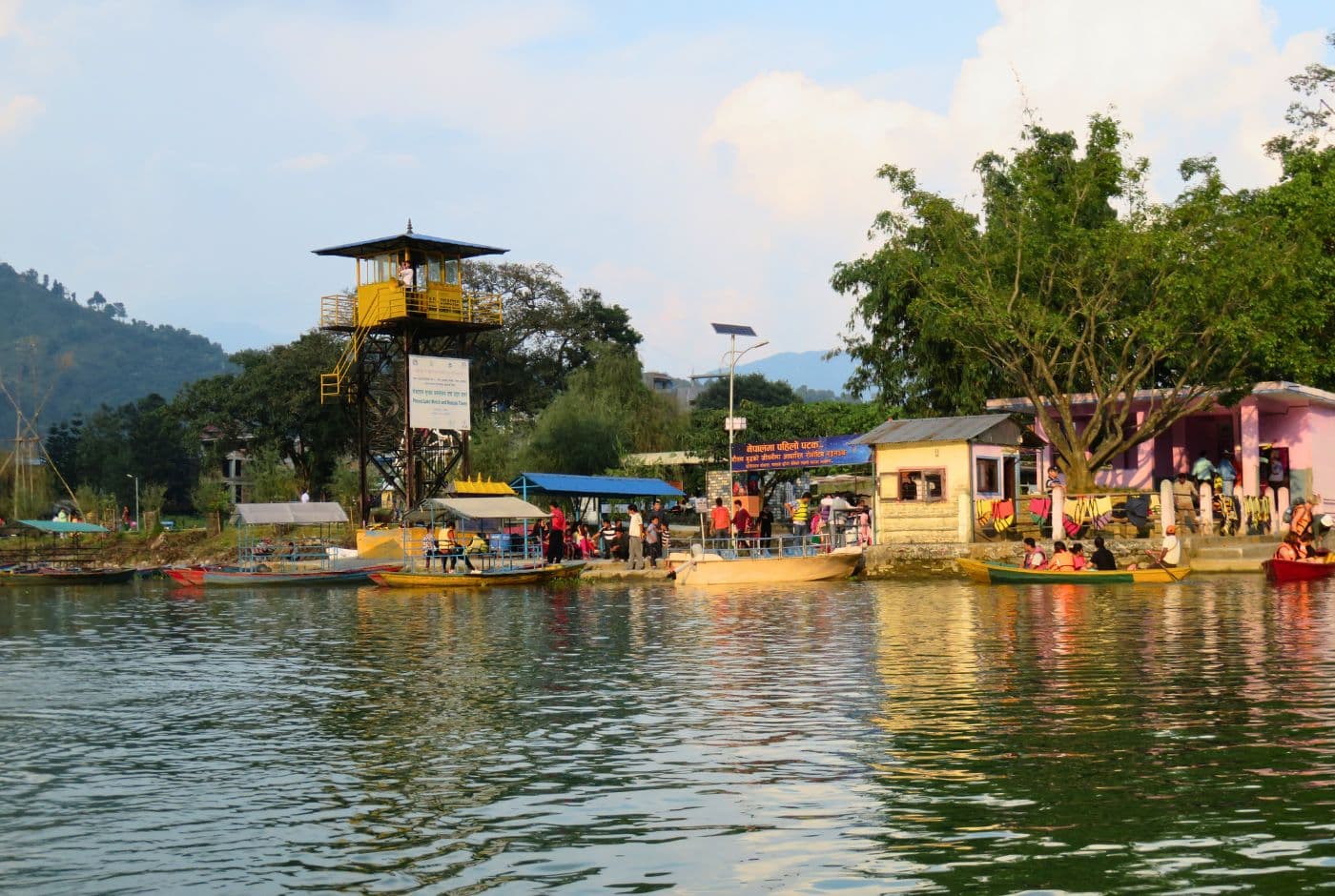 Colorful boats and lakeside stalls at Phewa Lake Pokhara