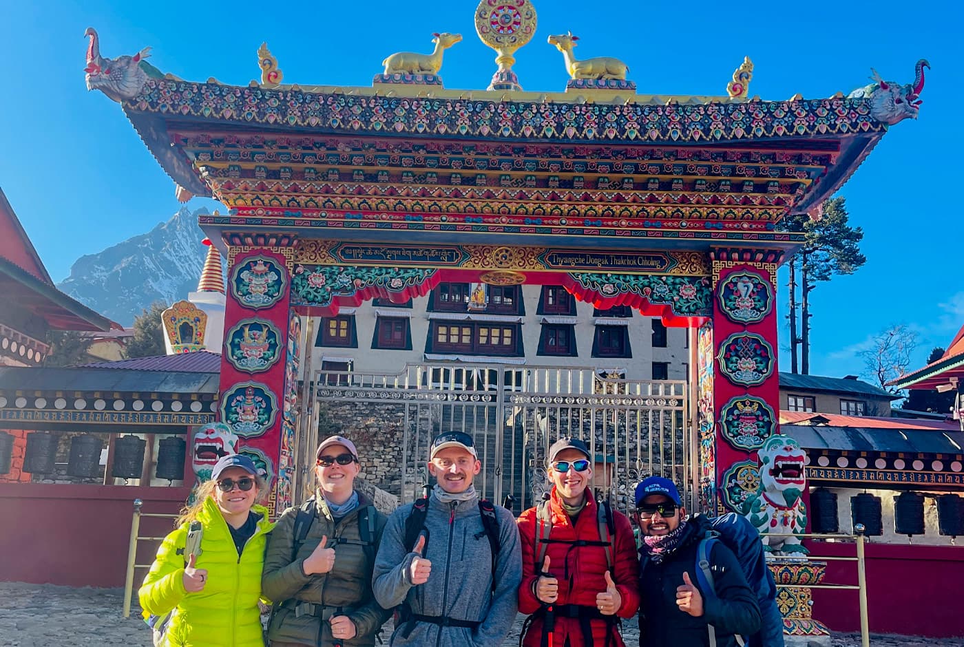Everest Base Camp Trek Package trekkers at Tengboche Monastery gate in Nepal