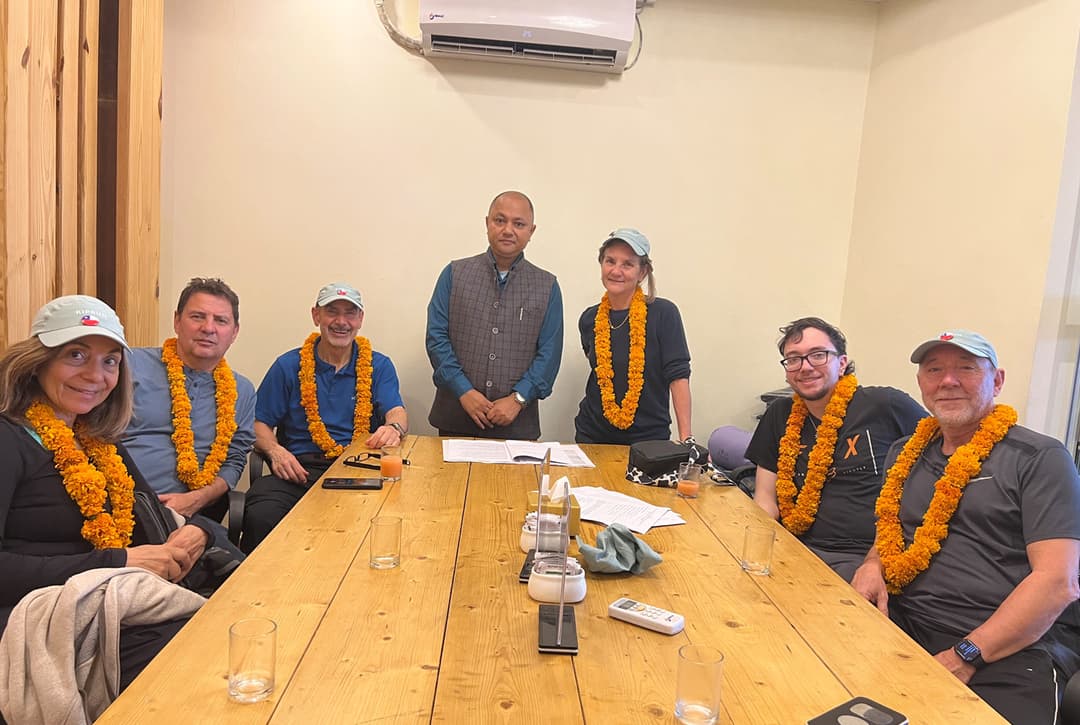 Pre-trek briefing at a Kathmandu hotel for the Everest Base Camp trek with Nepal Hiking Team guides and support staff.